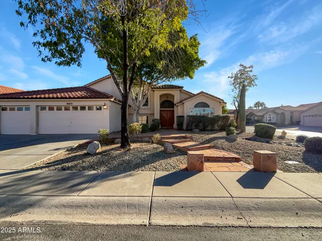a front view of a house with swimming pool