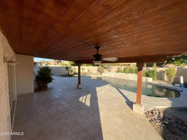 a view of a house with a yard balcony