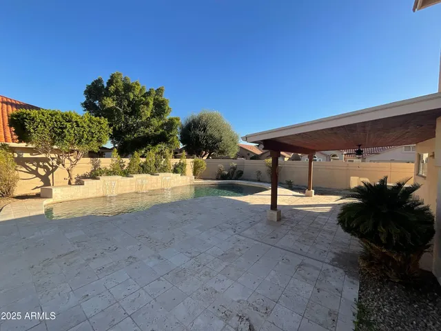 a picture of a bathroom with a shower