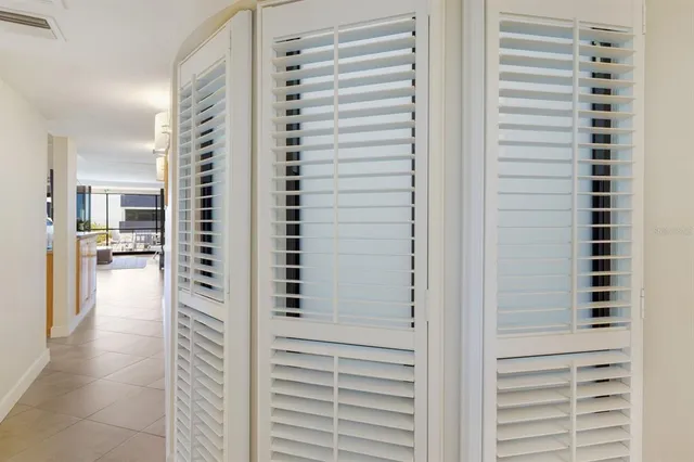 a view of a building with a palm tree