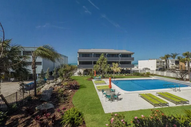 a view of a balcony with an outdoor space