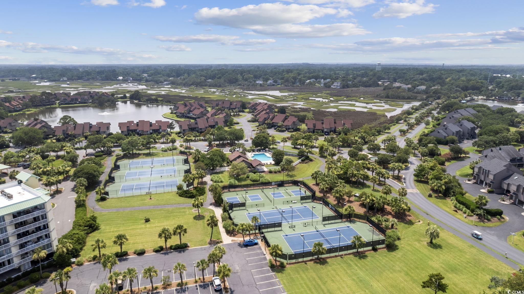 27 Riptide Lane Pawleys Island, SC 29585 - Photo 37 of 40 Aerial perspective of suburban area featuring a large body of water