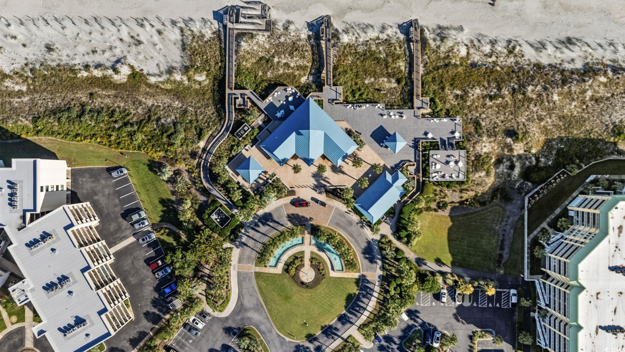 27 Riptide Lane Pawleys Island, SC 29585 - Photo 39 of 40 View of asphalt road with curbs