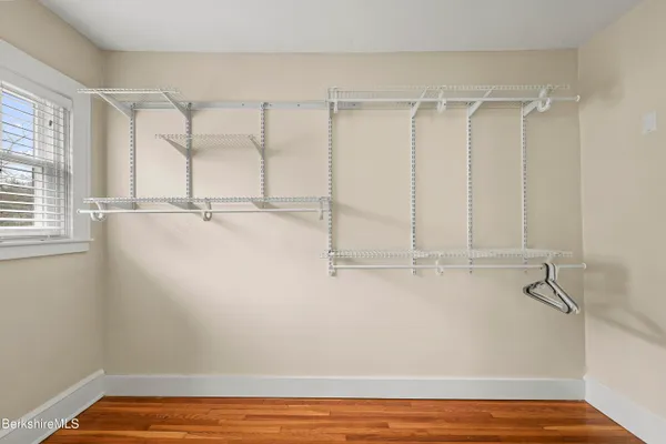 a view of a room with racks on the wall