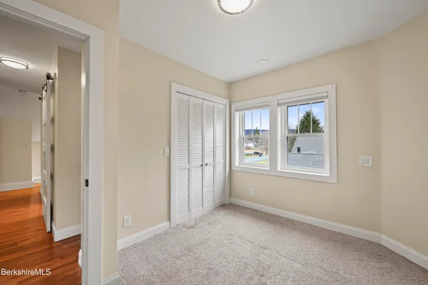 wooden floor and windows in an empty room