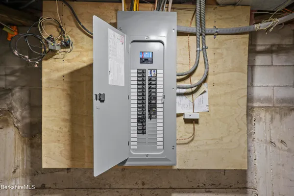 a view of a porch with chairs and backyard
