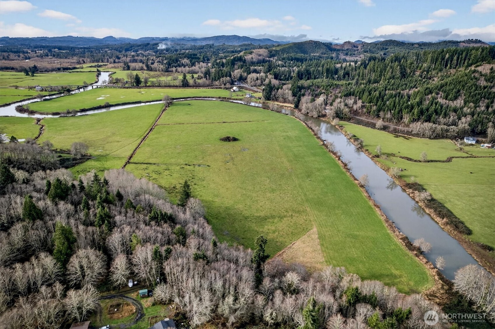 163 Barr Road Rosburg, WA 98643 - Photo 5 of 19 an aerial view of a residential houses with outdoor space and a lake view