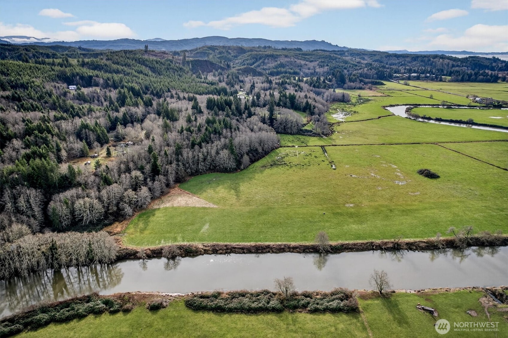 163 Barr Road Rosburg, WA 98643 - Photo 6 of 19 an aerial view of ocean with residential house and outdoor space