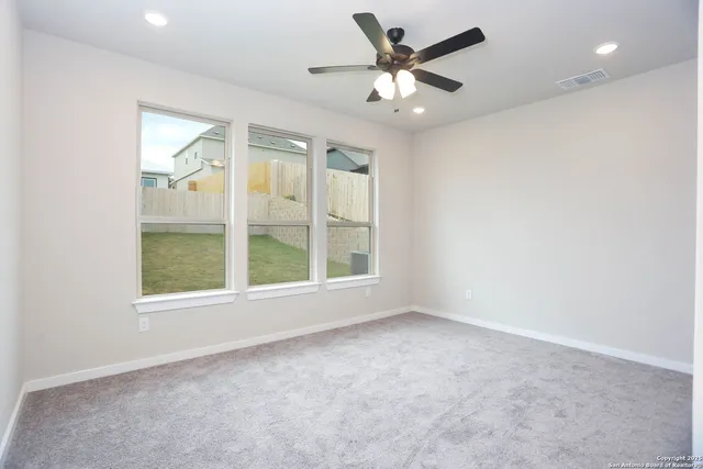 an empty room with a large window