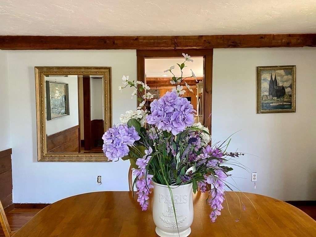 103 Clapp Road Scituate, MA 02066 - Photo 11 of 27 a vase of flowers sitting on a table