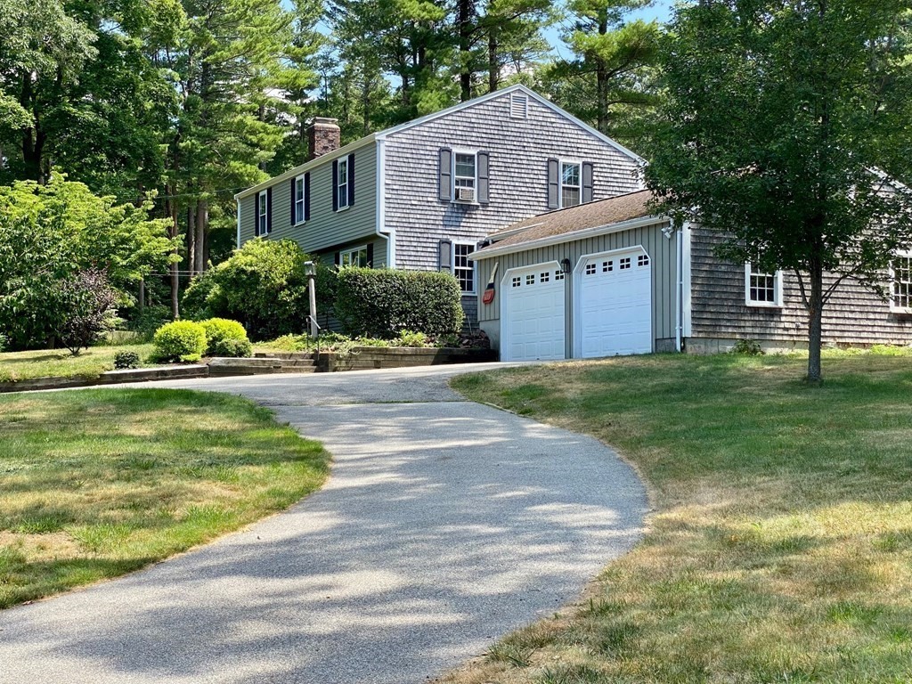 103 Clapp Road Scituate, MA 02066 - Photo 2 of 27 a front view of a house with a yard