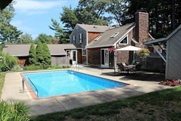 103 Clapp Road Scituate, MA 02066 - Photo 24 of 27 an outdoor space with swimming pool and furniture