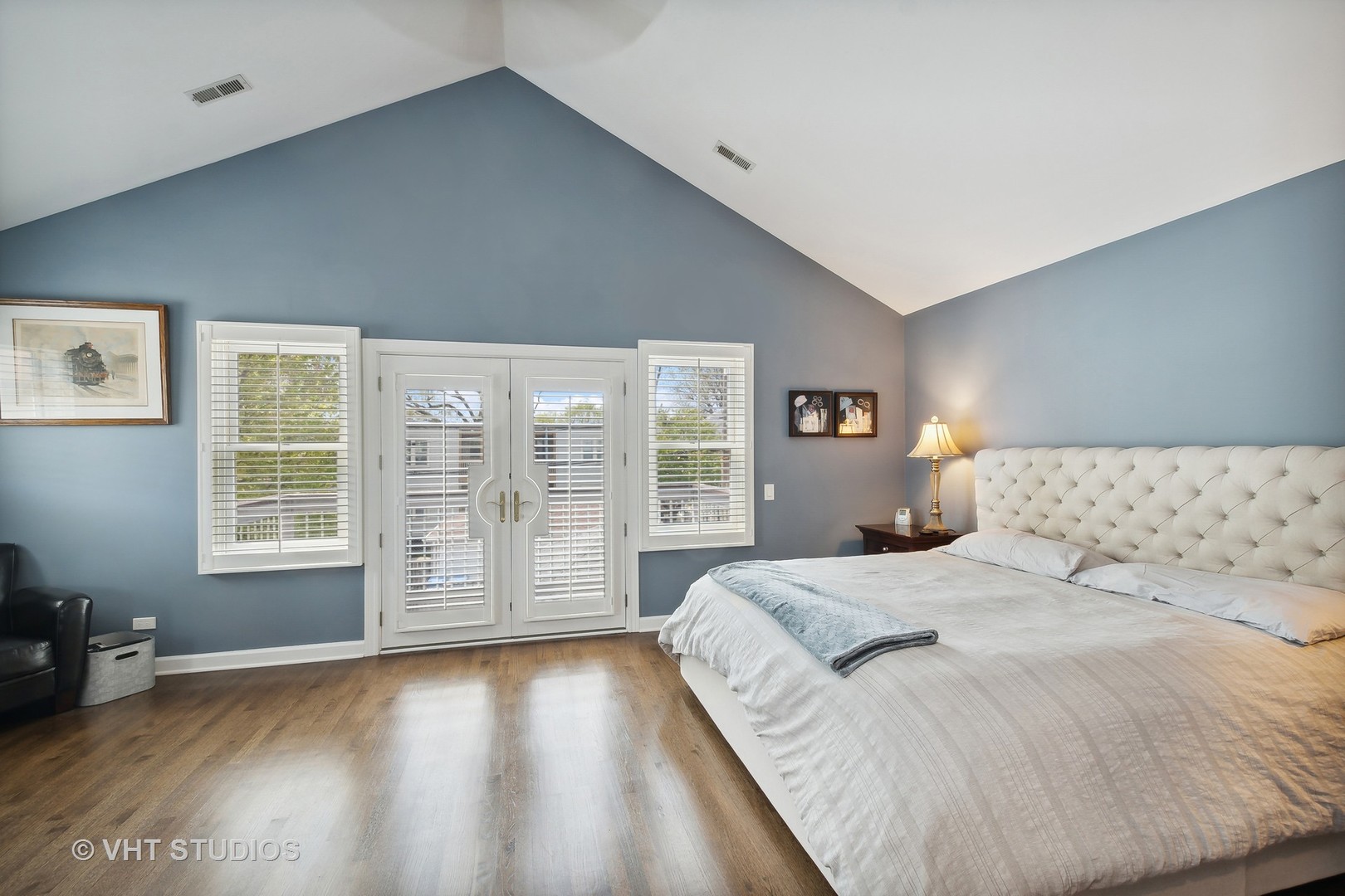 4122 North Kenneth Avenue Chicago, IL 60641 - Photo 11 of 27 a spacious bedroom with a large bed and a large window