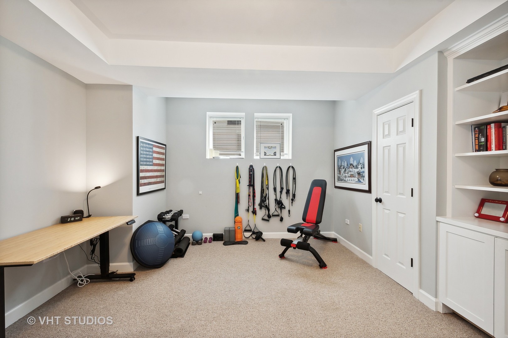 4122 North Kenneth Avenue Chicago, IL 60641 - Photo 16 of 27 a view of a workspace with furniture and gym equipment