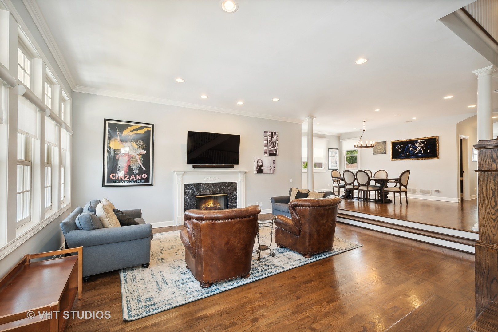 4122 North Kenneth Avenue Chicago, IL 60641 - Photo 2 of 27 a living room with furniture a flat screen tv and a window