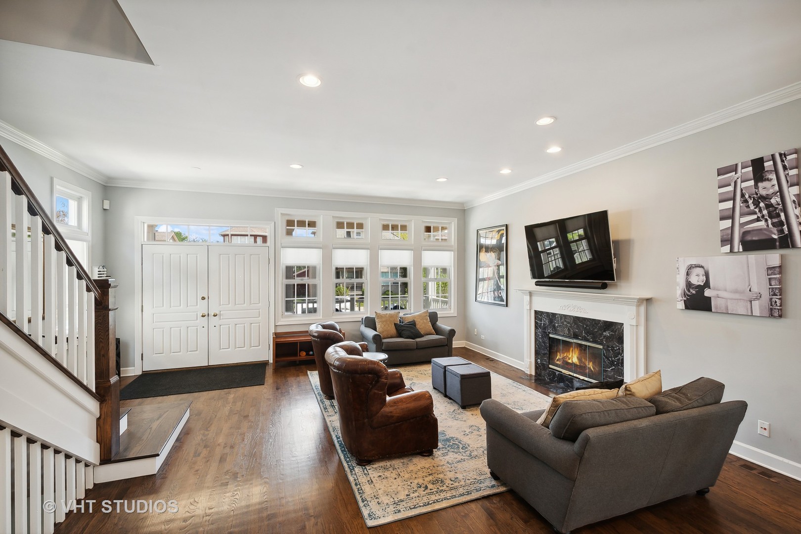 4122 North Kenneth Avenue Chicago, IL 60641 - Photo 4 of 27 a living room with furniture fireplace and a flat screen tv