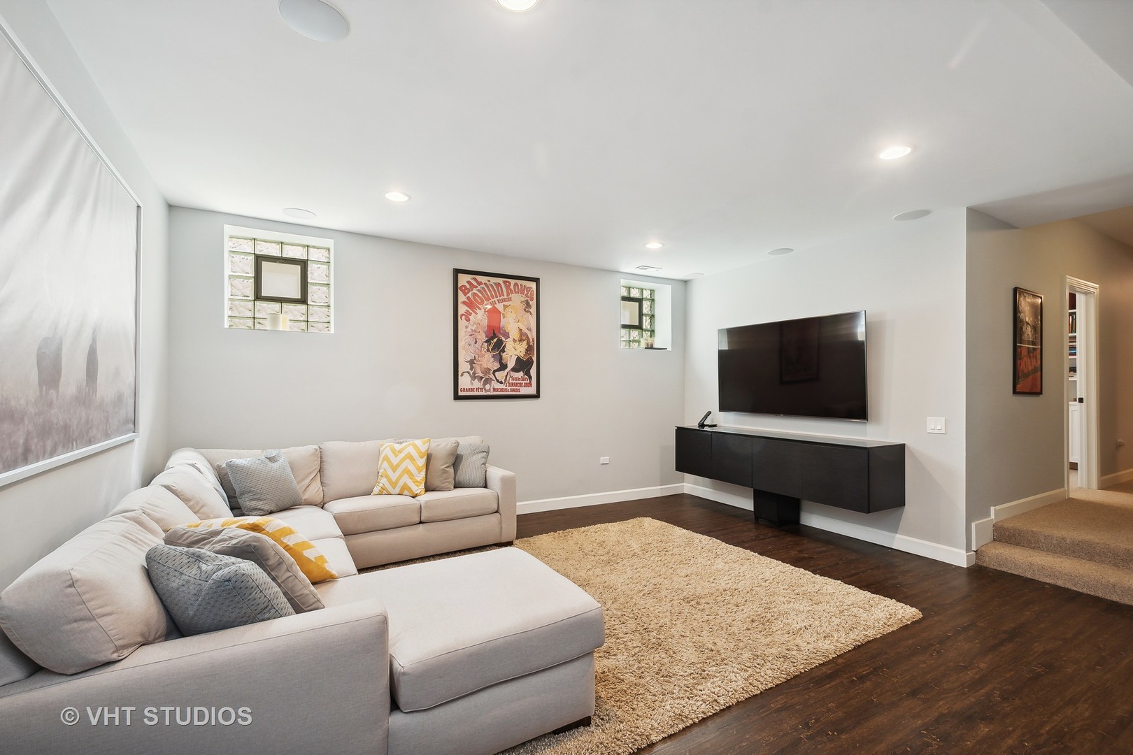 4122 North Kenneth Avenue Chicago, IL 60641 - Photo 10 of 27 a living room with furniture and a flat screen tv