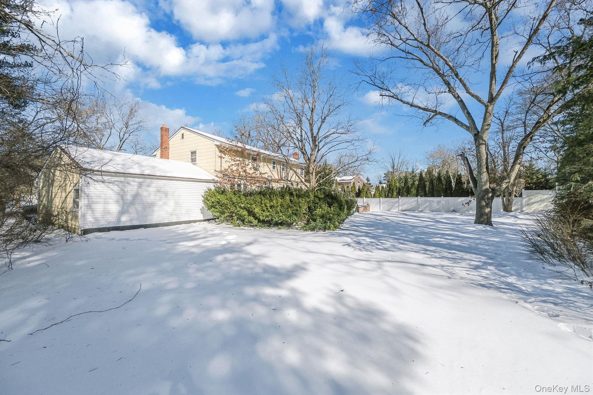 140 Seaman Neck Road Dix Hills, NY 11746 - Photo 18 of 21 a view of road and trees