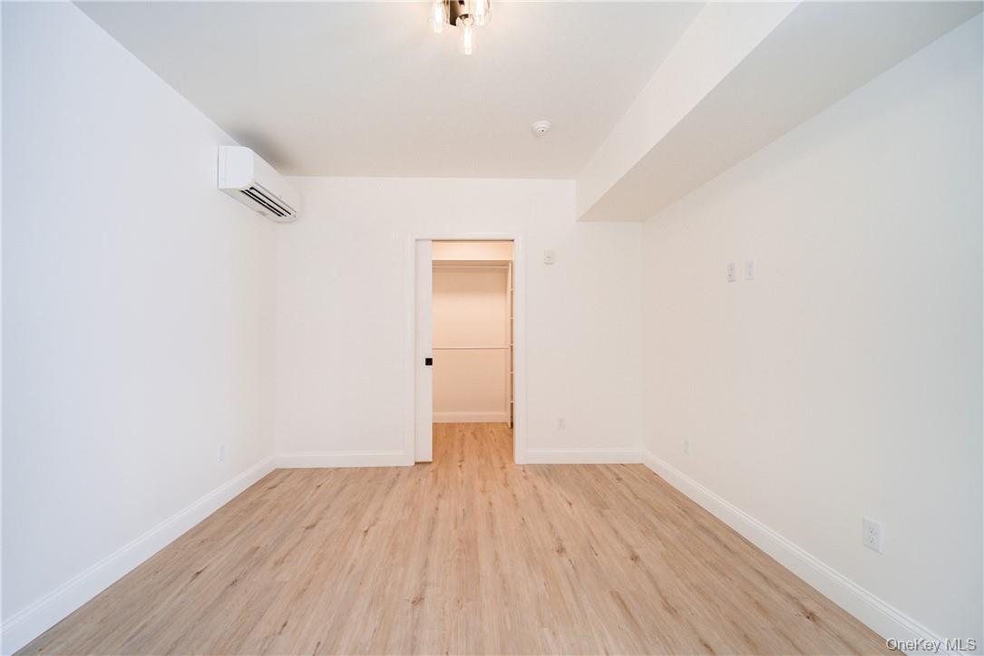 22 Lapis Drive, Unit B Beacon, NY 12508 - Photo 20 of 23 a view of a room with wooden floor
