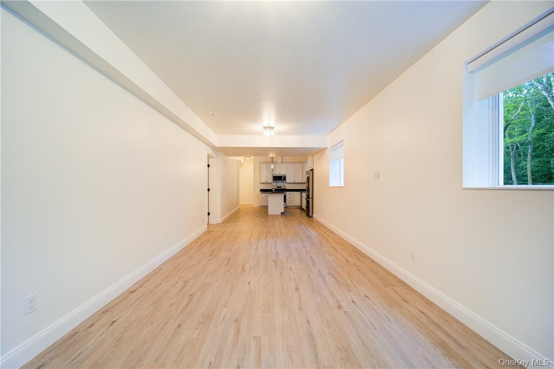 22 Lapis Drive, Unit B Beacon, NY 12508 - Photo 5 of 23 a view of a room with wooden floor