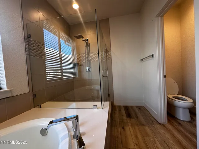a bathroom with a sink and a large mirror