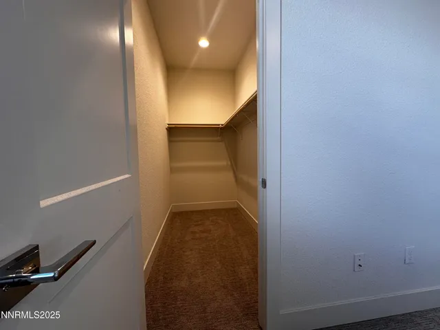 a view of hallway with stairs