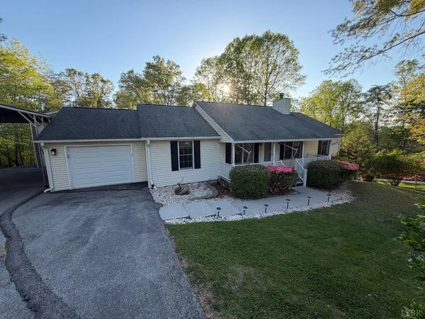 wooden floor in an empty room with a fireplace