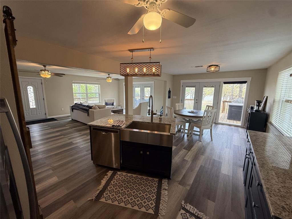 217 Comanche Trail Nocona, TX 76255 - Photo 4 of 13 a living room with furniture a window and wooden floor