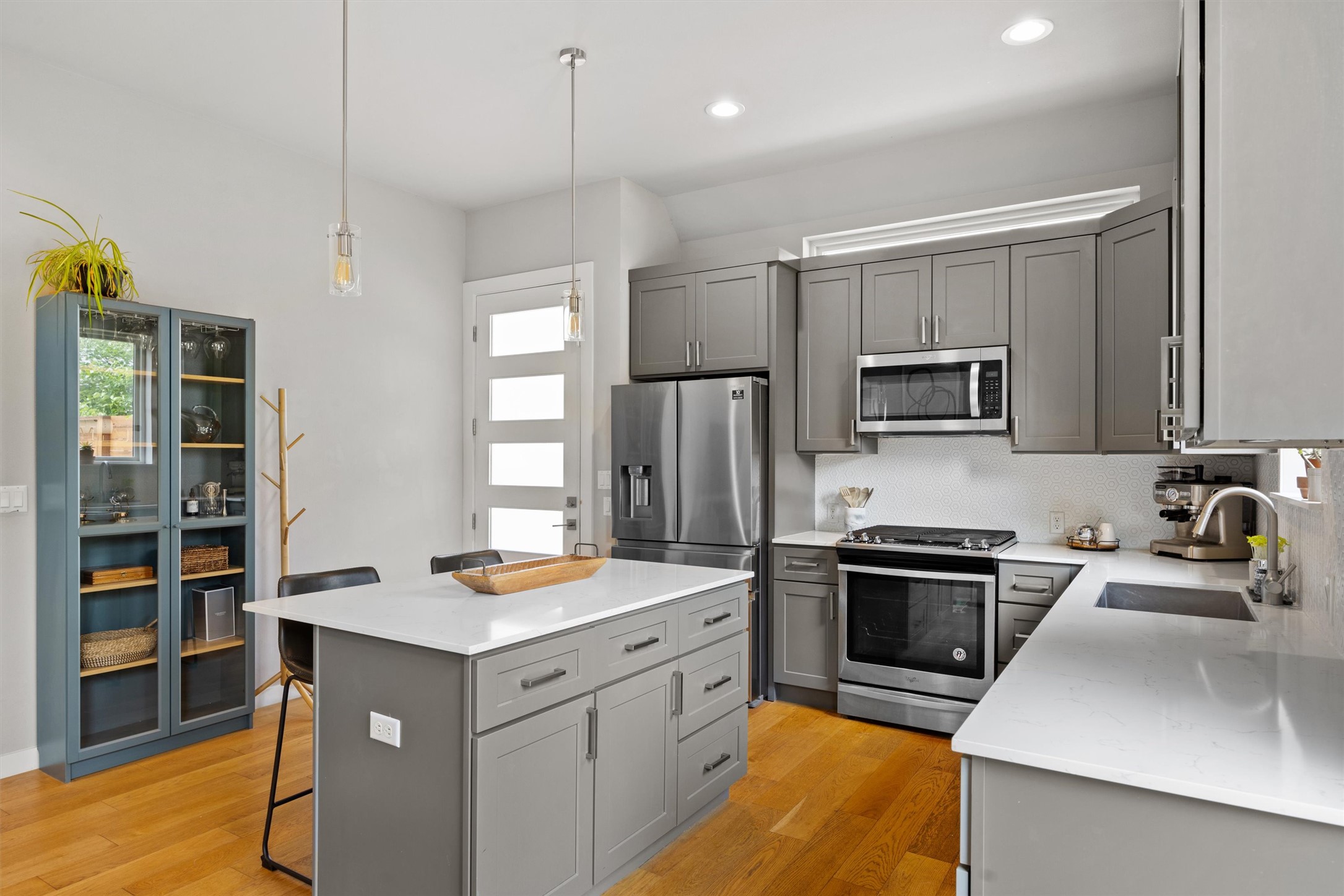 1116 Stobaugh Street, Unit B Austin, TX 78757 - Photo 13 of 38 Clean-lined cabinetry offers generous storage while maintaining a sleek modern aesthetic.