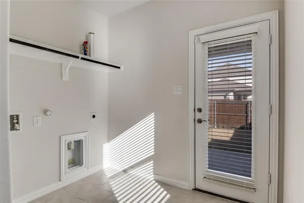 a view of a hallway with front door