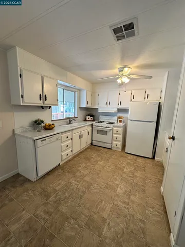 a workspace with furniture and window