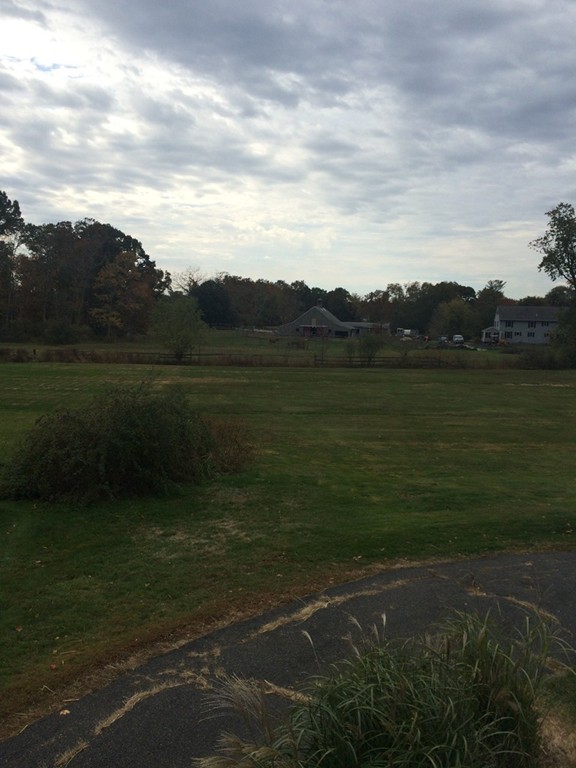 25 Argilla Road Ipswich, MA 01938 - Photo 3 of 20 a view of a lake with mountains in the background
