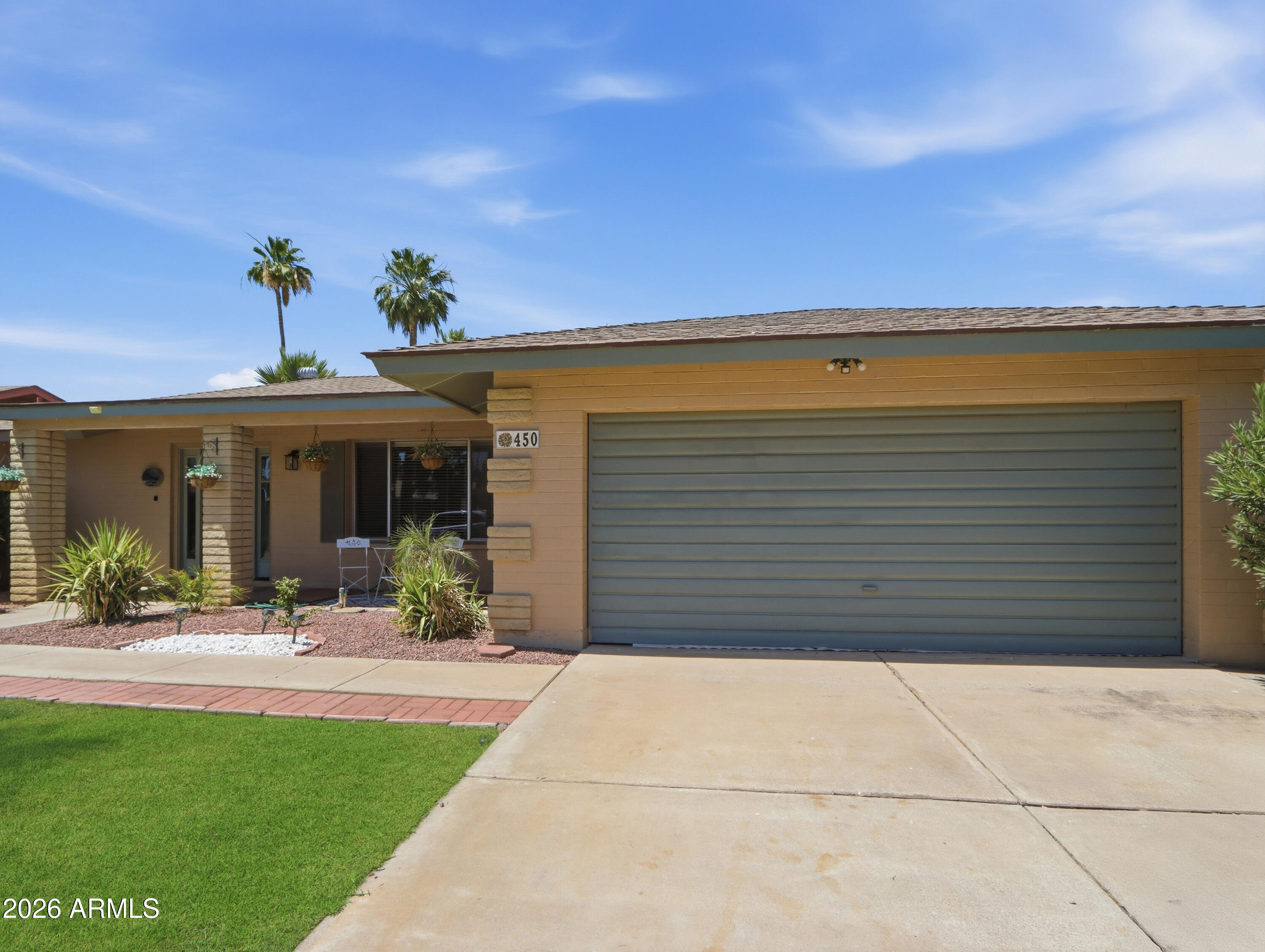 450 Cascada Road Litchfield Park, AZ 85340 - Photo 3 of 40 a front view of house with yard