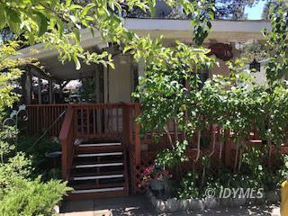 18 Pine Cove Road Idyllwild, CA 92549 - Photo 1 of 14 a view of entryway with flower plants