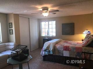 18 Pine Cove Road Idyllwild, CA 92549 - Photo 11 of 14 a bedroom with a bed and window
