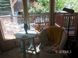 18 Pine Cove Road Idyllwild, CA 92549 - Photo 12 of 14 a view of balcony with wooden floor and outdoor seating