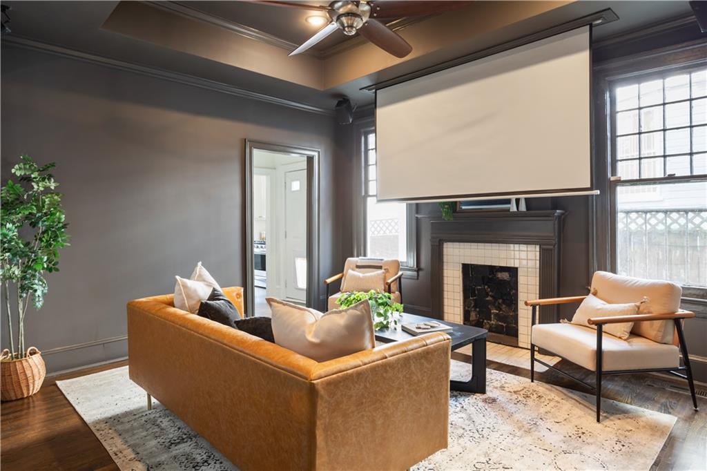 679 Lawton Street Southwest Atlanta, GA 30310 - Photo 11 of 45 a living room with furniture and a fireplace