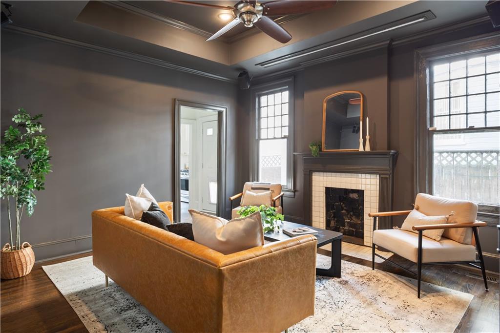 679 Lawton Street Southwest Atlanta, GA 30310 - Photo 13 of 45 a living room with furniture and a fireplace