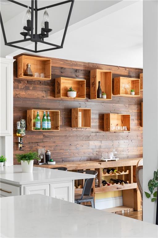 679 Lawton Street Southwest Atlanta, GA 30310 - Photo 18 of 45 a kitchen with stainless steel appliances granite countertop a stove and cabinets