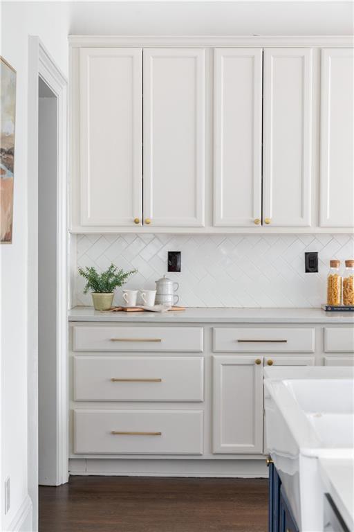 679 Lawton Street Southwest Atlanta, GA 30310 - Photo 20 of 45 a kitchen with cabinets appliances and a sink