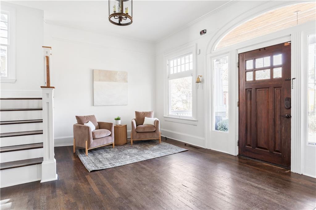 679 Lawton Street Southwest Atlanta, GA 30310 - Photo 2 of 45 a living room with furniture and wooden floor