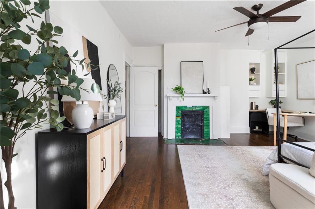 679 Lawton Street Southwest Atlanta, GA 30310 - Photo 28 of 45 a view of a hallway with wooden floor and staircase