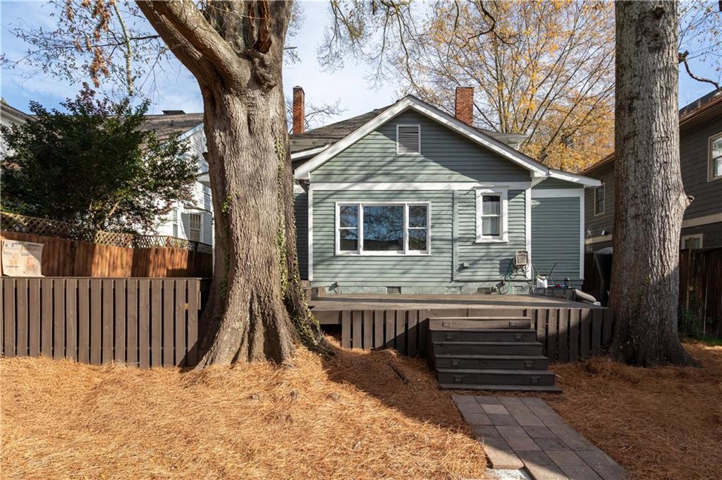 679 Lawton Street Southwest Atlanta, GA 30310 - Photo 36 of 45 a view of house with a yard