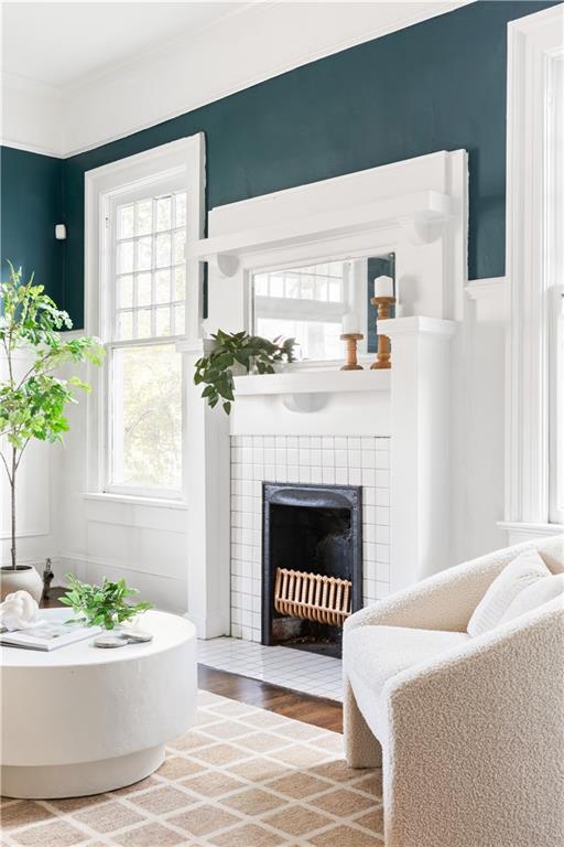 679 Lawton Street Southwest Atlanta, GA 30310 - Photo 5 of 45 a living room with a fireplace and a potted plant