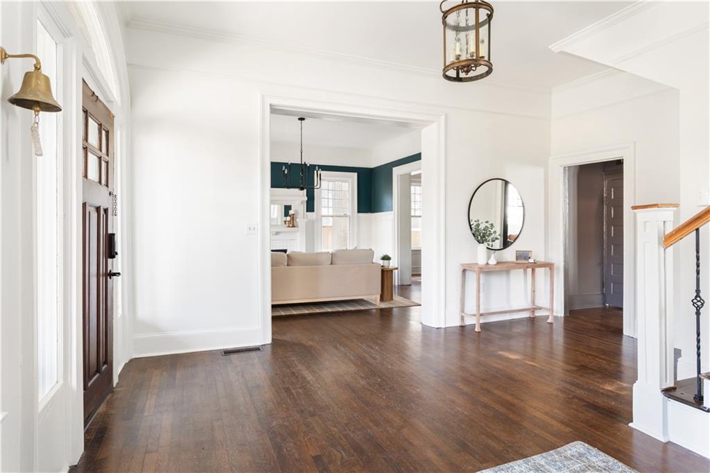 679 Lawton Street Southwest Atlanta, GA 30310 - Photo 6 of 45 a view of livingroom with furniture and wooden floor