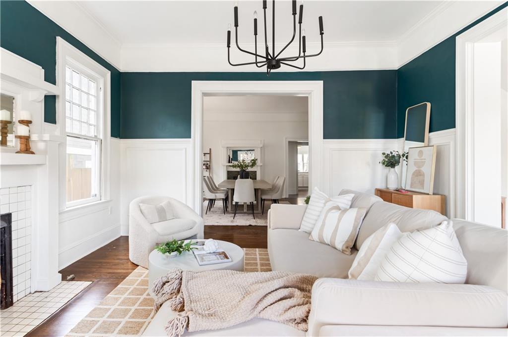 679 Lawton Street Southwest Atlanta, GA 30310 - Photo 7 of 45 a living room with furniture and a fireplace