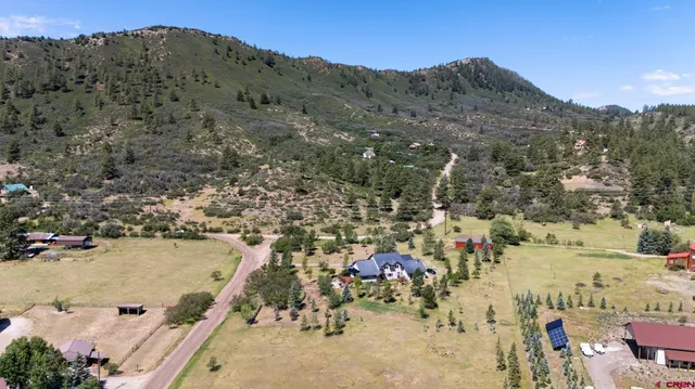 an aerial view of residential house with outdoor space