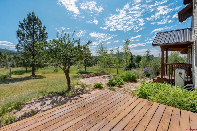 a view of a town with mountains in the background