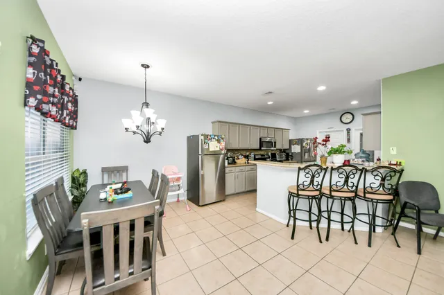 a view of a dining room with furniture