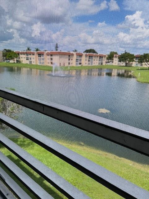 2811 North Pine Island Road, Unit 301 Sunrise, FL 33322 - Photo 1 of 4 a view of lake with city view
